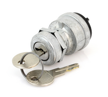 Load image into Gallery viewer, A silver metal automotive or motorcycle ignition lock cylinder with two keys attached
